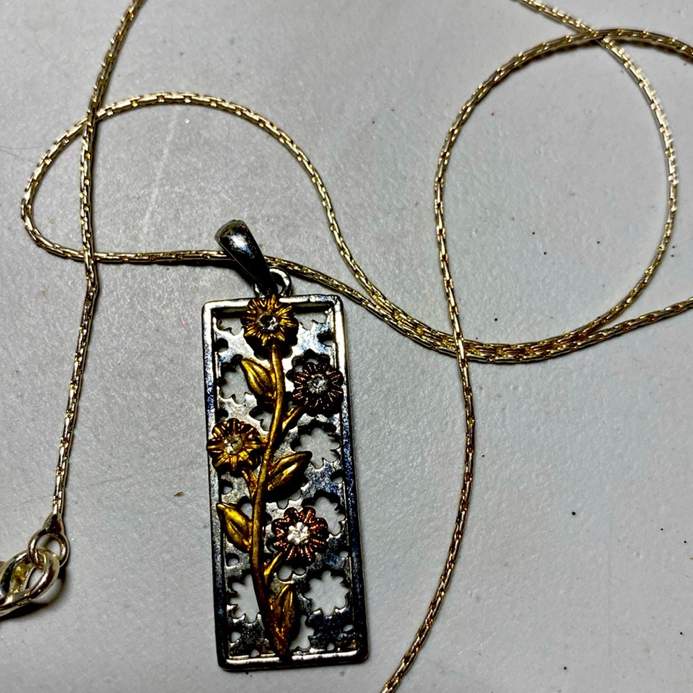 Flowers on stem set silver background. Brass, silver, copper diamond chips?
